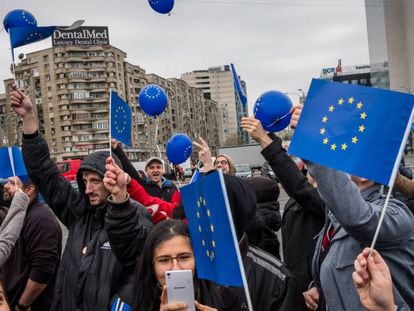 Romanians march with European Union flags in Bucharest in March.