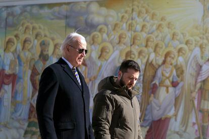 US President Joe Biden, left, walks with Ukrainian President Volodymyr Zelenskiy at St. Michaels Golden-Domed Cathedral during an unannounced visit, in Kyiv, Ukraine, Monday, Feb. 20, 2023.