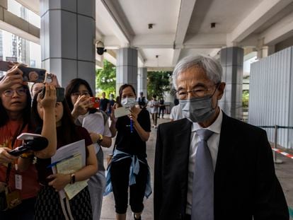 Martin Lee, right, the founding chairman of the city’s Democratic Party, leaves high court after a ruling on a challenge that he and six other activists had filed against their conviction on charges of organizing and taking part in an unauthorized assembly in Hong Kong, Monday, Aug. 14, 2023