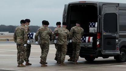 Members of the United States Honor Guard carry the remains of the three American service members who died in Jordan during a drone attack at Dover Air Base in Dover, Delaware.