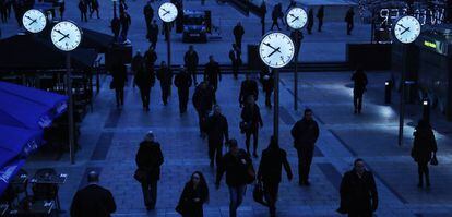 Workers in London's financial district make an early start.