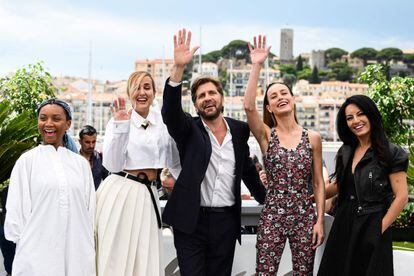 Cannes jury president Ruben Ostlund, center, poses with jury members Rungano Nyoni, from left, Julia Ducournau, Brie Larson and Maryam Touzani, on May 16, 2023.
