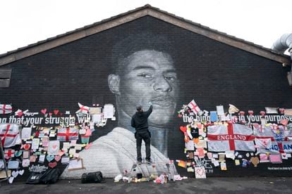 A mural dedicated to Manchester soccer player Marcus Rashford after it was vandalized following the Euro final.