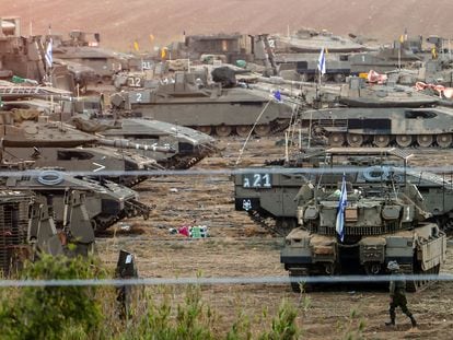 Israeli troops at a rally site at an undisclosed location along the Israel-Gaza border in southern Israel on October 18.