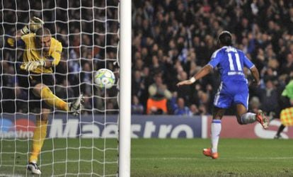 Didier Drogba wheels away in delight after scoring at Stamford Bridge. 