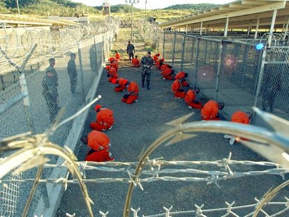 January 11, 2002 photograph released by the U.S. Navy showing the first 20 prisoners at Guantanamo Bay, Cuba, shortly after their arrival.