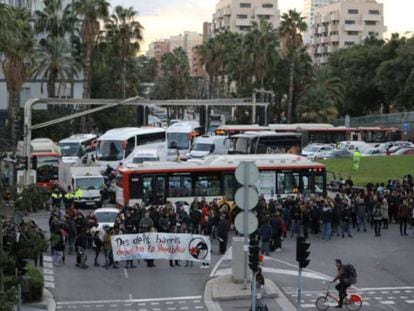Protesters block a street in Barcelona during the strike on October 3.