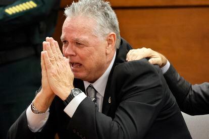 Former Marjory Stoneman Douglas High School School Resource Officer Scot Peterson reacts as he is found not guilty on all charges at the Broward County Courthouse in Fort Lauderdale