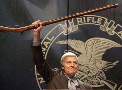 Charlton Heston addresses attendees at the 129th Annual Meeting of the National Rifle Association in 2000.