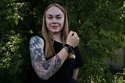 Nastia Korol, a 24-year-old combat paramedic, shows some of the tattoos she had before the Russian invasion along with some she is now getting that are related to the conflict.