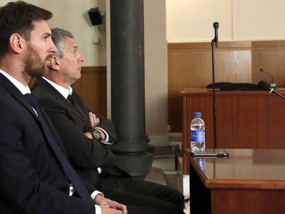 Leo Messi and his father, Jorge Horacio Messi, in court in Barcelona.