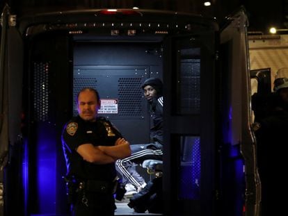 A protestor in a police van after being arrested during demonstrations in New York last week.
