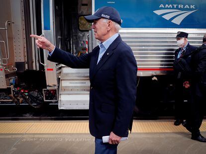 Joe Biden greets supporters after arriving at an Amtrak train for a campaign stop in Alliance, Ohio, on September 30, 2020.