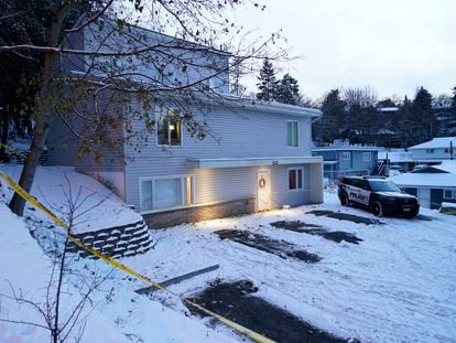 Bare spots are seen, Nov. 29, 2022, in the snowy parking lot in front of the home where four University of Idaho students were found dead on Nov. 13, in Moscow, Idaho, after vehicles belonging to the victims and others were towed away earlier in the day.