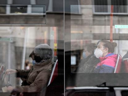 Passengers wearing face masks on a bus in the Spanish city of Burgos.