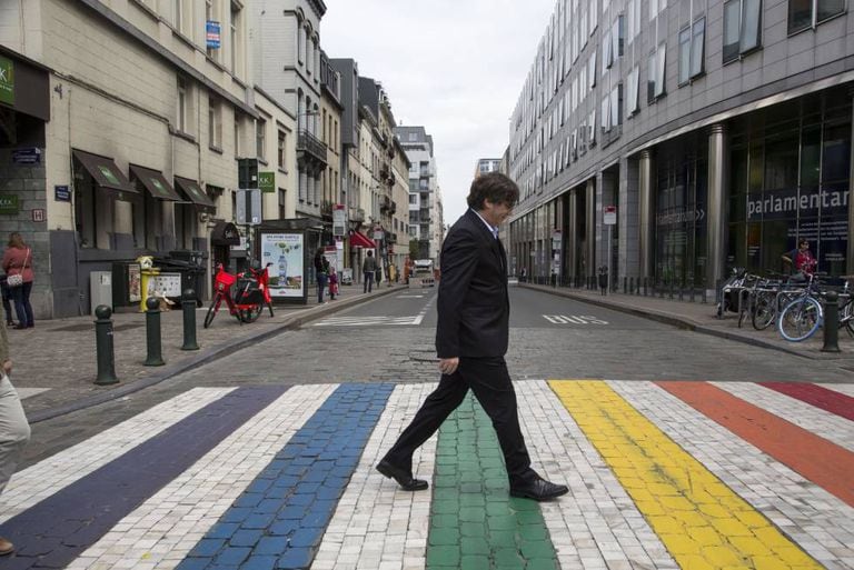 Carles Puigdemont walks towards the European Parliament.