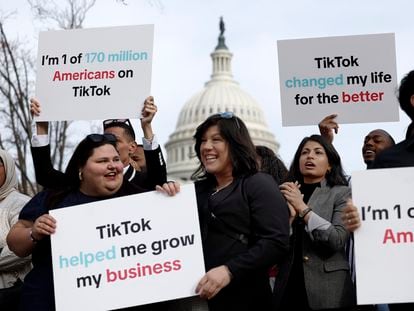A group of TikTokers demonstrates in front of Capitol Hill on Wednesday, the day Congress voted to force the sale of the social network.