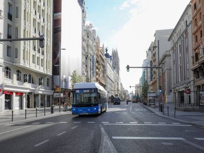 Madrid's Gran Vía, normally a hub of activity, is largely deserted due to the lockdown.