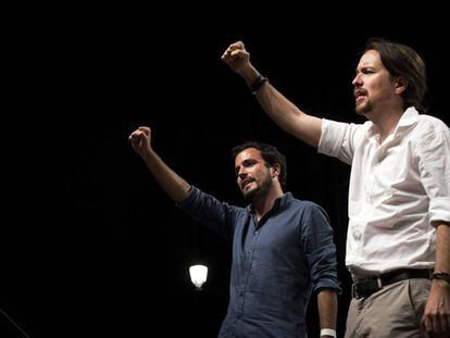 Alberto Garzón. left, and Pablo Iglesias at an event on election night