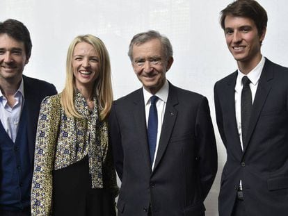 LVMH chairman Bernard Arnault with three of his five children: from left, Antoine, Delphine and Alexandre, in Paris in 2015.