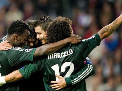 Cristiano Ronaldo (second right) celebrates scoring against Ajax in Real&rsquo;s 1-4 win in Amsterdam. 