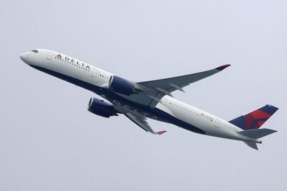 A Delta Air Lines Airbus A350-900 plane takes off from Sydney Airport in Sydney, Australia, October 28, 2020.