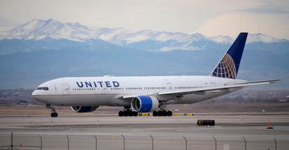 A United Airlines jetliner taxis to a runway for take off from Denver International Airport
