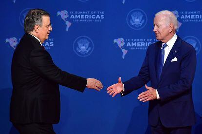 Mexican Foreign Minister Marcelo Ebrard greets US President Joe Biden upon arrival at the Summit of the Americas.