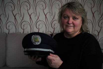 Iryna Sukhikh holds the cap of her son Ihor, who died on March 24 while defending the city of Irpin.