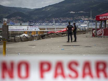 Scene the day after a seaside boardwalk collapsed during a nighttime concert in Vigo.