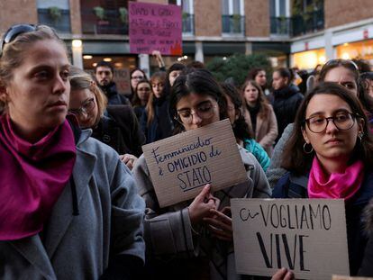 Students hold banners reading 'Femincide is a state murder' and 'We want us alive' as they perform a flash mob to protest against feminicide and violence against women in Milan, Italy, November 22, 2023.