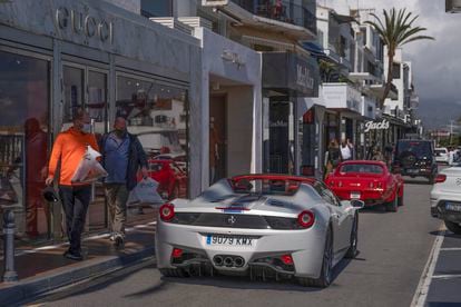 Luxury cars remain a common sight in Puerto Banús, an upscale area of Marbella.
