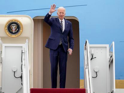 President Joe Biden waves as he boards Air Force One at Andrews Air Force Base, Md., Thursday, Jan. 19, 2023, en route to California.