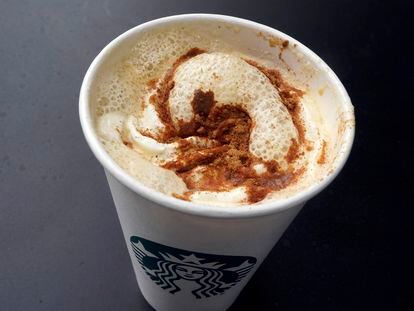 A Pumpkin Spice Latte drink rests on a table at a Starbucks in New York, Thursday, Aug. 24, 2023.