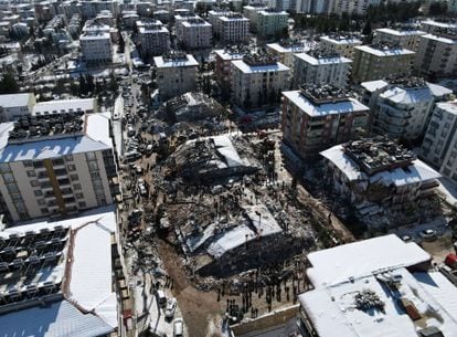 An aerial view taken with a drone shows collapsed buildings as rescue works continue in the aftermath of a major earthquake in the Besni district of Adiyaman city, Turkey.