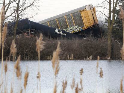 Cars of a Norfolk Southern cargo train lie toppled on one another after derailing at a train crossing with Ohio 41 in Clark County, Ohio, on Saturday, March 4, 2023.