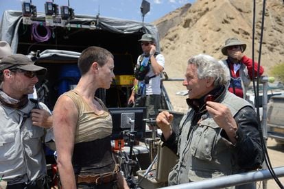 George Miller with Charlize Theron on set at the filming of 'Mad Max: Fury Road'