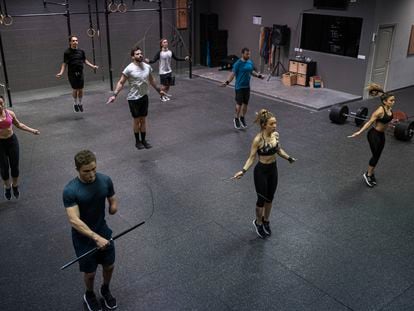 A group of people exercise in a gym in Eibar, in northern Spain.
