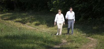 Angela Merkel with Mariano Rajoy in Berlin on Monday.