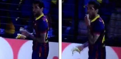 A screen grab of Alves eating the banana thrown during Sunday's match.