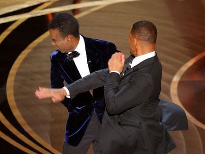 Will Smith hits Chris Rock onstage during the 94th Academy Awards in Hollywood, Los Angeles, California, on March 27, 2022.