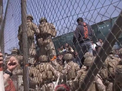 This image from a video released by the Department of Defense shows U.S. Marines at Abbey Gate before a suicide bomber struck outside Hamid Karzai International Airport on Aug. 26, 2021, in Kabul, Afghanistan