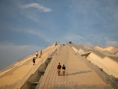 Tourists visit the pyramid that once housed a museum about the late communist dictator Enver Hoxha, in Tirana.