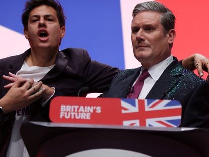 A protester throws glitter at Britain's Labour Party Leader Keir Starmer at Britain's Labour Party annual conference in Liverpool, Britain, October 10, 2023.