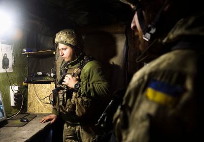 Ukrainian servicemen on guard near Katerynivka village, not far from the city of Luhansk, on Wednesday.