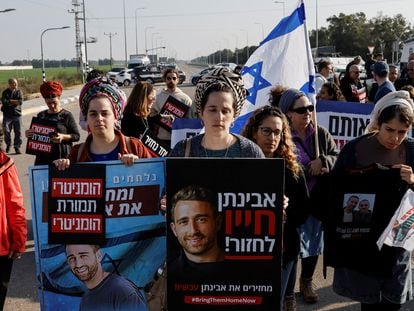 Relatives of the hostages being held by Hamas protest against aid entering Gaza until they are released, near the Kerem Shalom crossing, the entry point for trucks from Egypt, on January 9.