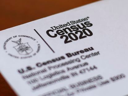 An envelope containing a 2020 census letter mailed to a U.S. resident sits on a desk on on April 5, 2020, in Detroit.