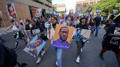 A group of protesters marches after former police officer Derek Chauvin was sentenced to 22.5 years in prison for the murder of George Floyd, in June 2021, in downtown Minneapolis.