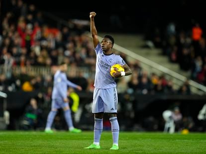 Real Madrid's Vinicius Junior celebrates after scoring his side's first goal during the La Liga soccer match between Valencia and Real Madrid at the Mestalla Stadium in Valencia, Spain, Saturday, March 2, 2024.