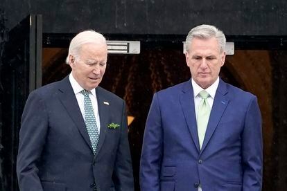 President Joe Biden and House Speaker Kevin McCarthy of Calif., walk down the House steps as he departs the Capitol following the annual St. Patrick's Day gathering in Washington, Friday, March 17, 2023.